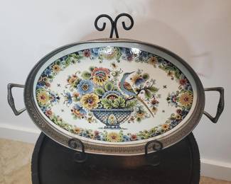 This beautiful hand painted Royal Delft porcelain serving tray has had one owner.  It is in excellent condition and features an elegant floral design with a bowl, and bird.  The tray measures 18 1/4" x 10 3/8" x 1 3/4".