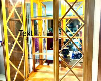 Lighted, solid pine with glass shelves, and mirrored back to show off your best pieces. 78"H, 41" W, 14" D