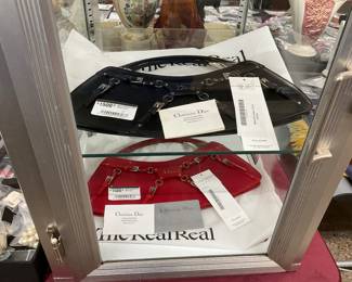 Labeled and priced used from the real real. We’ve had these for over a month now priced at $1500 each, but nobody’s walking in with three grand in their pocket so $500 each out the door must mention this ad ask for Mike  this is Christian Dior clutch? Sorry, not a purse guy, but the price tag used is three grand or so each. Also not an expert but came from a millionaire’s home. Sold as is as shown. 
