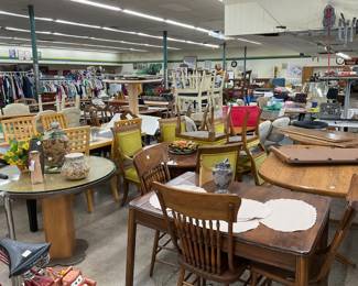 Tables and chairs galore brown table in front is 40