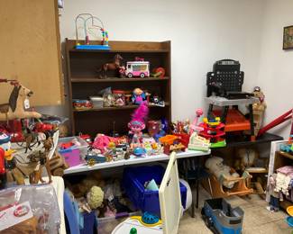 Lots of kids toys The pink troll and back found online for $30 our price $2.50 as an example