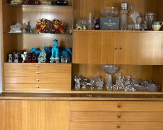Lots of quality glass pieces, lion sculpture, and ceramic foo dogs