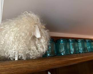 wool wood figure and blue candle holders