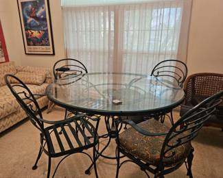 6 piece heavy metal dining set with cushions. 47.5" across
Another chair not shown , plus matching bar stool for extra
$40