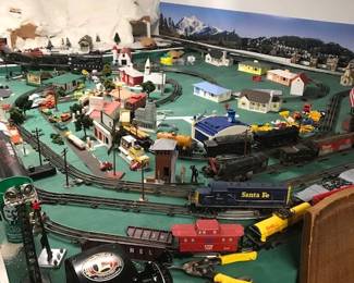 This waterfront home has a basement and a train set Vintage locomotives and transformers and tons of accessories