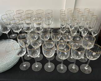 Gold rimmed stemware. Over 12 pieces of each size