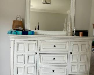 Large white dresser and mirror. Dresser is 66”W x 45-1/2”H x 18”D. 
Mirror is 45” x 44”