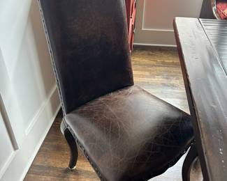Two faux leather side chairs, 