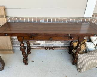 Console table, writing table, dining table. The top folds out on both sides. 