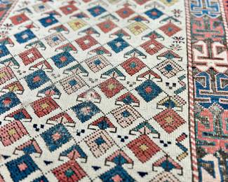 Antique Rug approximately 57 In. by 32 In. 