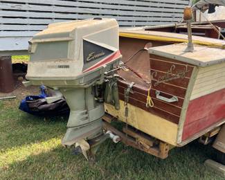 With an iconic Evinrude Outboard Motor. 