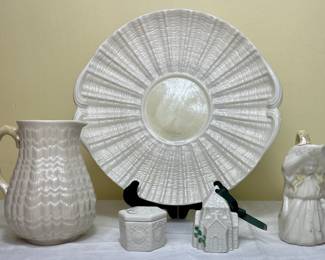 Belleek Ireland Porcelain Milk Maid Creamer, Tridacna Pitcher with Twig Handle, Belleek Porcelain 6 sided Trinket Box, Fourth Edition Church Shaped Bell Ornament and Limpet Yellow Cake Plate