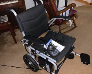 Electric wheelchair by Journey Air.  Nearly new