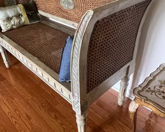 34. Carved Cane Settee (50" x 15" x 32")