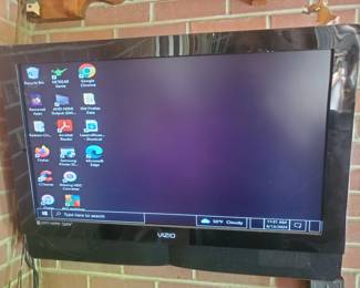 Multiple large and small flat screen TV's