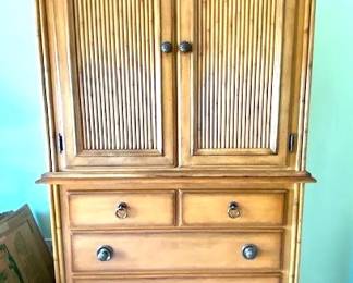 SOLD   Sale Price is $349  Tommy Bahama Entertainment Center                     78 1/2" Tall x 43 1/2 " wide  x 20 1/2 " deep                     
314-494-7222