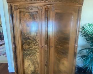 SOLD   $ 350 Antique  2 Door Walnut Armoire  Great Condition 6' 3 1/2'  Tall x 22" deep x 58 1/2" wide    314-494-7222