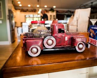 Look at that collectible Red Pick Up.