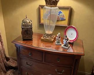 One of a pair of bedside chests