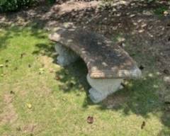 One of 4 concrete benches