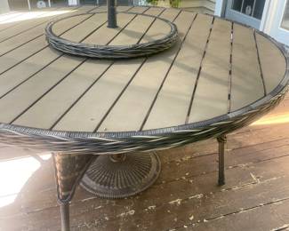 Dine in style with the Lorca dining set, featuring a woven top, and rotating lazy Susan. Crafted from durable wicker with a light tan and ebony finish, it's perfect centerpiece for your outdoor space. This Lorca Outdoor 11 piece Dining Set features Aluminum Frame with Synthetic UV Wicker, features Sunbrella fabric cushions and available in light Ebony finish color.

The ProShade umbrella features Sunbrella fabric and the stand is included. 

Set includes 67" round table with lazy susan and 8 arm chairs. While only 6 fit around the table, it's nice to have a couple extra chairs for friends who stop by to pull up.

Dimensions:  
Arm Chair: 23"w x 27"d x 34"h
67" Round Table:  67″w x 67″d x 30″h 