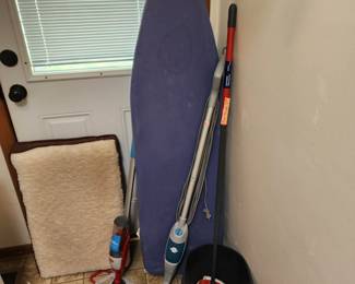 Ironing board, mop and bucket