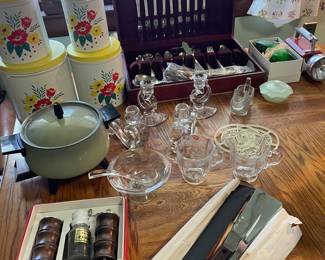 Historian, flatware, brand new vintage canisters, knife set