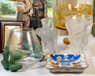 Several Lalique items including an "Antinea" vase, "Liberty Eagle" and a "Martinets" vase.