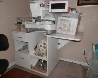 Baby Lock 6 needle embroidery machine by Suzuki machinery.  Includes special table, lots of thread and other accessories.