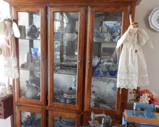 6 door walnut surround glass lighted display cabinet...Delft and other goodies inside