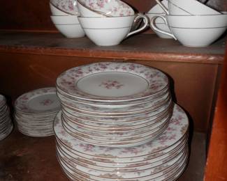 10 5 piece place settings plus 20 inch serving platter and other serving pieces