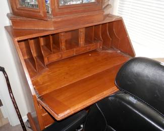 Photo of previous desk with front open....nice pigeon holes...2 horizontal drawers and 2 upright hiding places