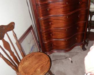 Antique piano swivel piano chair....solid oak with ball and claw feet and pressed back artistry........Antique mahogany double bow front 6 drawer chest...claw feet...nice piece....see next photo