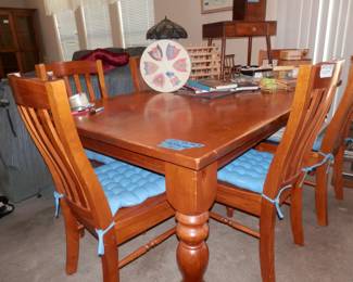 SOLID yellow pine (a hardwood) country style table ....one solid piece top, lathe turned legs and six matching side chairs.....ROCK SOLID 
