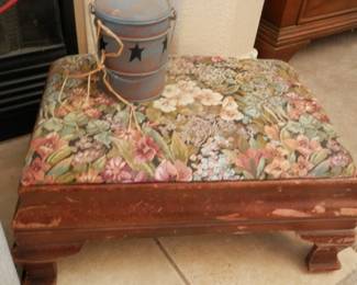Very old, anyique foot stool covered in colorful tapestry!