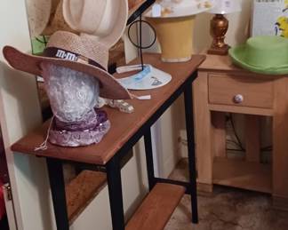 One of the side tables and more hats