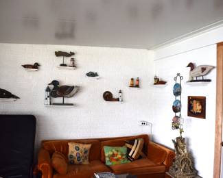 the enclosed porch with the granny-core sofa