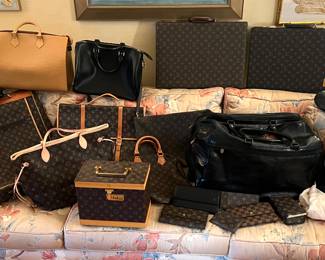 Many Louis Vuitton Bags, wallets, briefcases, carry on bag, garment bag etc.  All Authentic.....