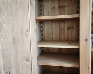 Inside the pine cabinet