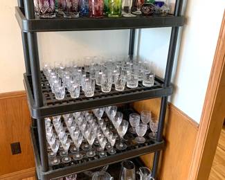 Lots of Waterford glasses and Carolyne colored  crystal 