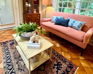 Antique rugs, bamboo coffee table, matching sofas, slim fit antique curio cabinet, handwoven baskets, custom pillows and more...