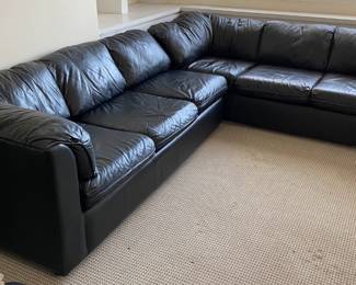 Two-Piece Black Faux Leather Sectional Sofa Bed