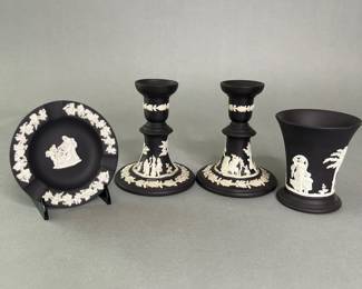 Group Of Wedgwood Black Basalt Jasperware: Pair Of Candlesticks, Ashtray And Small Vase