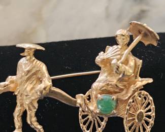 14kt with jade brooch/pendant..we have certs for this