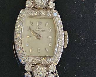 White gold encrusted with diamonds Vintage Lady Hamilton..we have certs for this