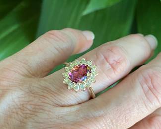 #64 - $480 - 14kt gold stone - 1 carat diam. 1ct center stone possibly pink sapphire. 5.3grams - sz 5.5