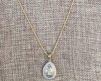 #65 - $650 - 1.2 ct diamond pendant on 10kt gold 3.grams with 18" rope chain 14kt 18" gold rope chain 2.7 gr.