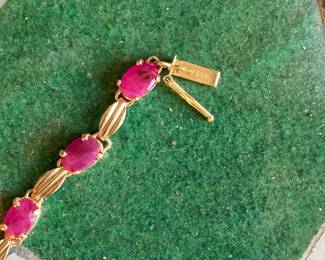 #66 - $550- 7 1/2" -14kt yellow gold & ruby bracelet -6.7 grams.