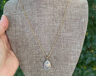 #65 - $650 - 1.2 ct diamond pendant on 10kt gold 3.grams with 18" rope chain 14kt 18" gold rope chain 2.7 gr.