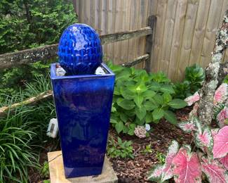 #55 - $150. Blue fountain with pinecone 13x13x36
